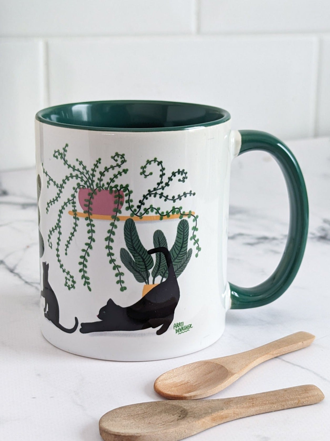 Plant Kitties (black cats, green accents) – ceramic mug