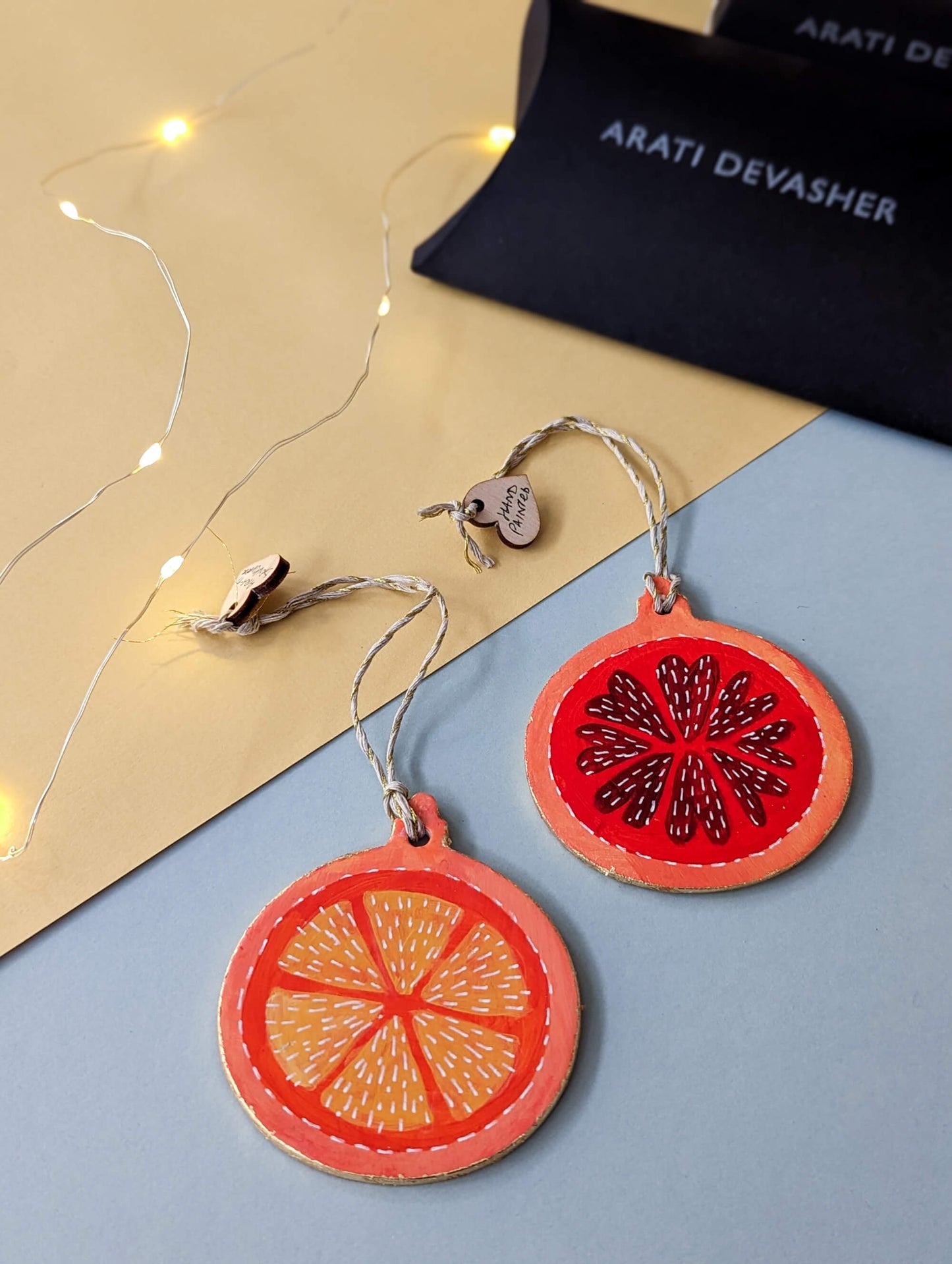 A Candied Orange ornament – (end of line) hand painted bauble