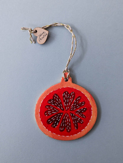 A Candied Orange ornament – (end of line) hand painted bauble
