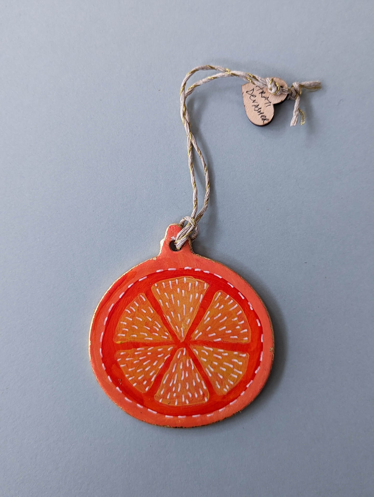 A Candied Orange ornament – (end of line) hand painted bauble