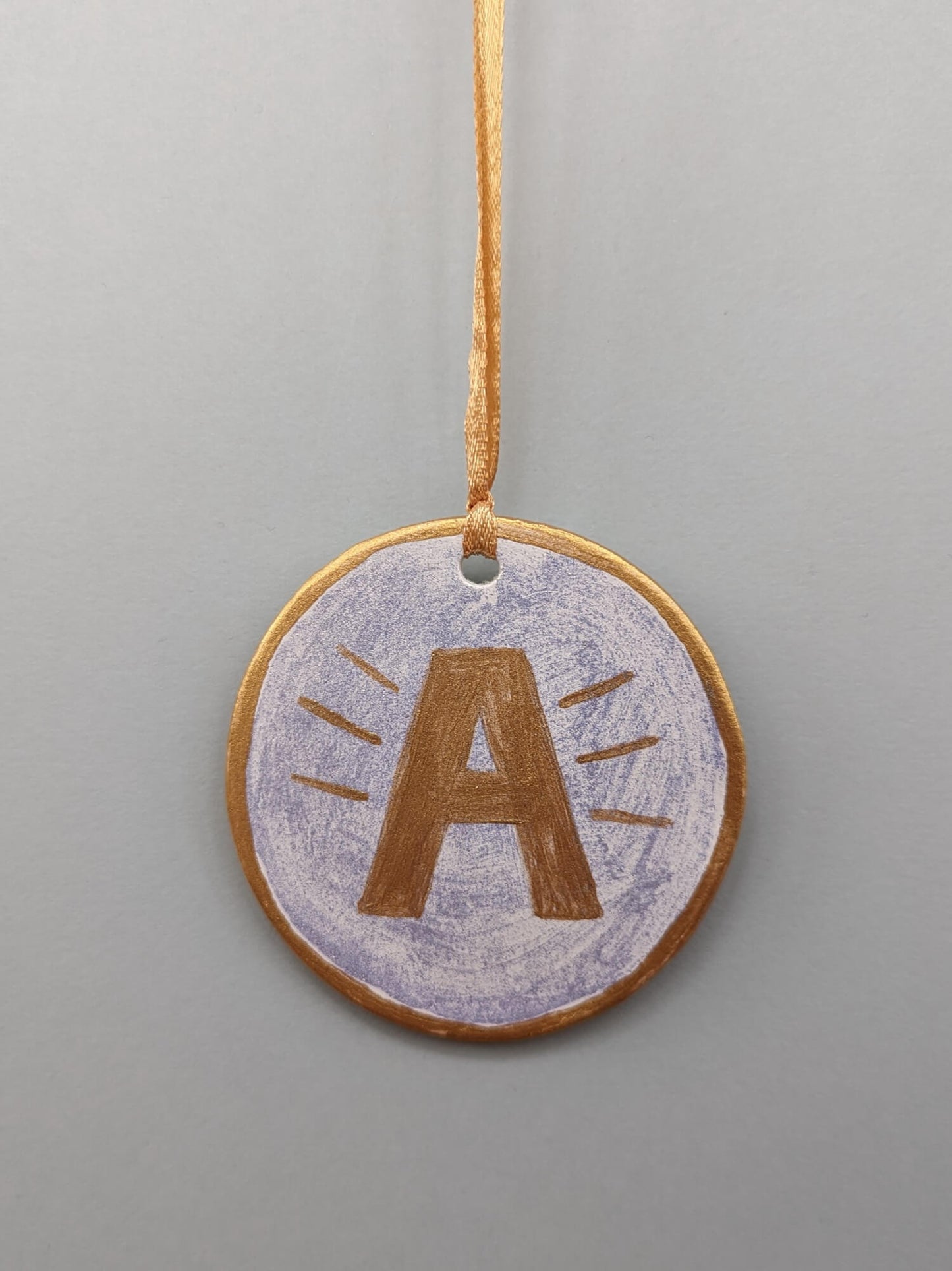 A First Christmas ornament – hand painted bauble