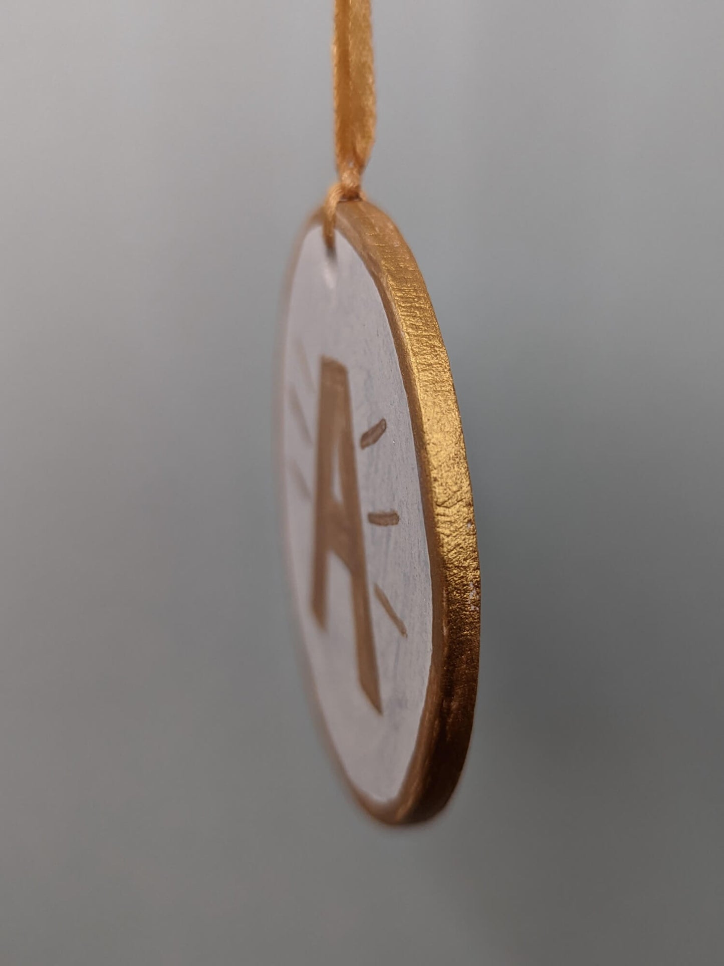A First Christmas ornament – hand painted bauble
