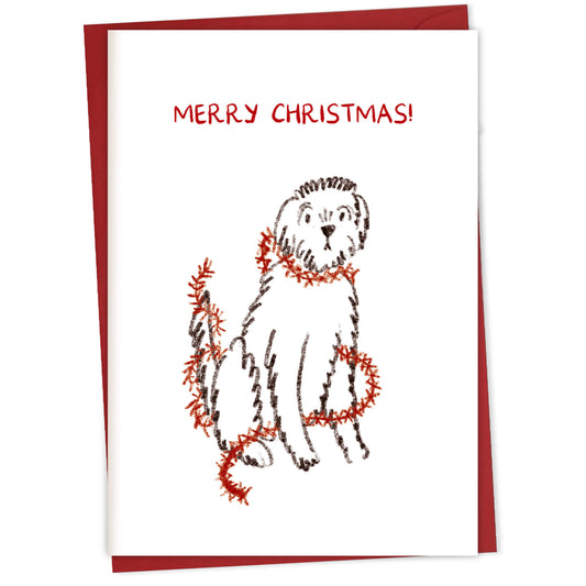 Xmas Naughty Dog in Tinsel – greeting card