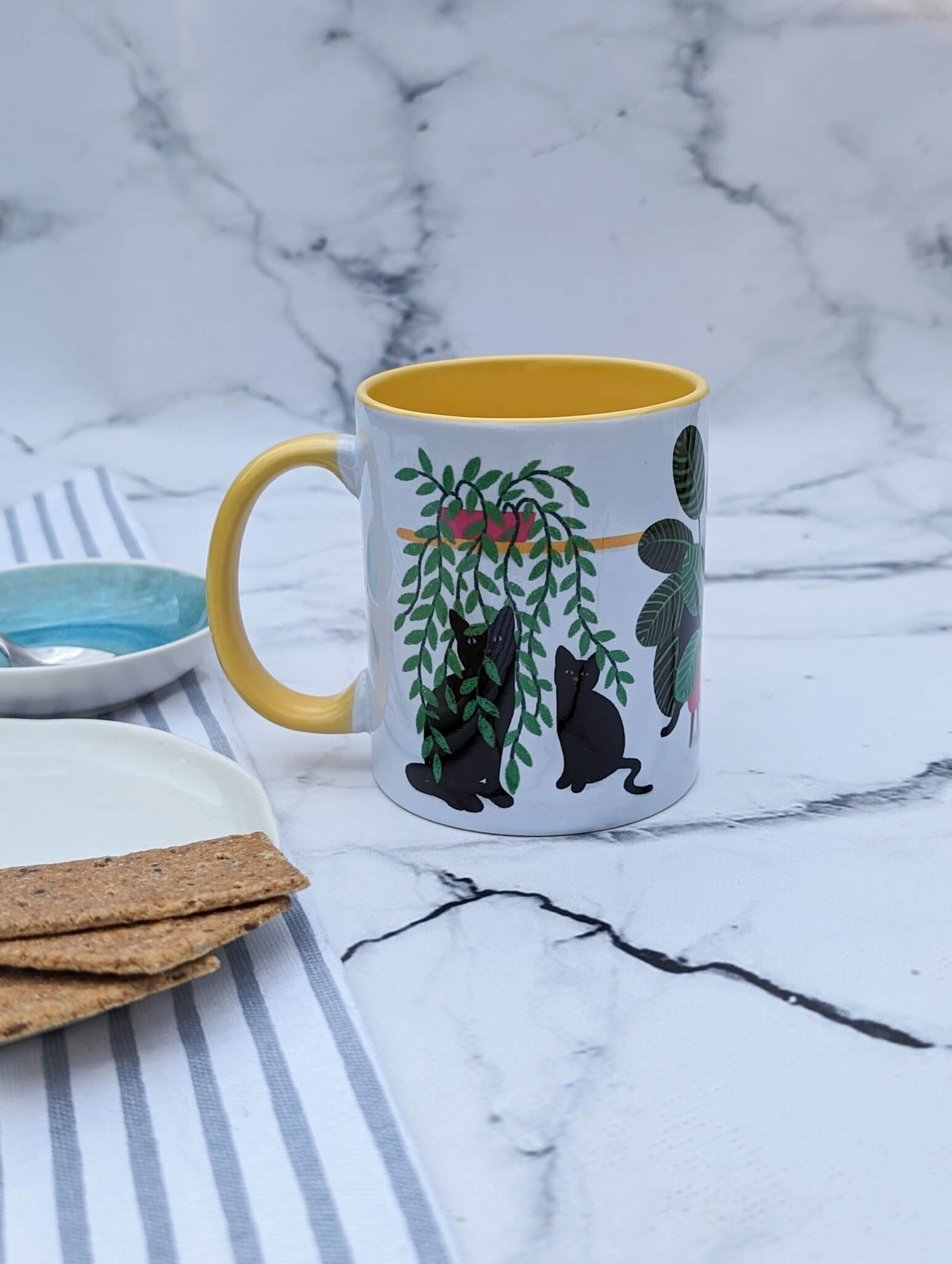 Plant Kitties (black cats, yellow accents) – ceramic mug