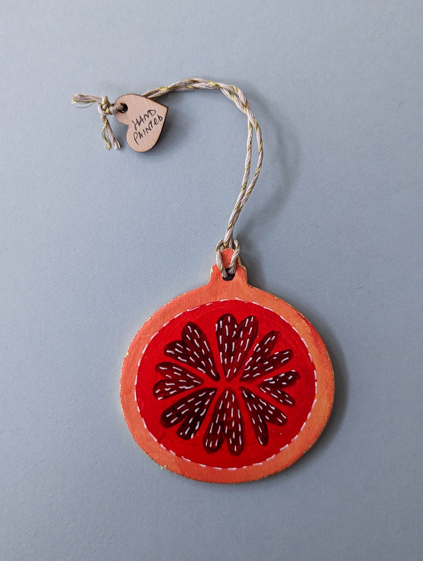 A Candied Orange ornament – hand painted bauble