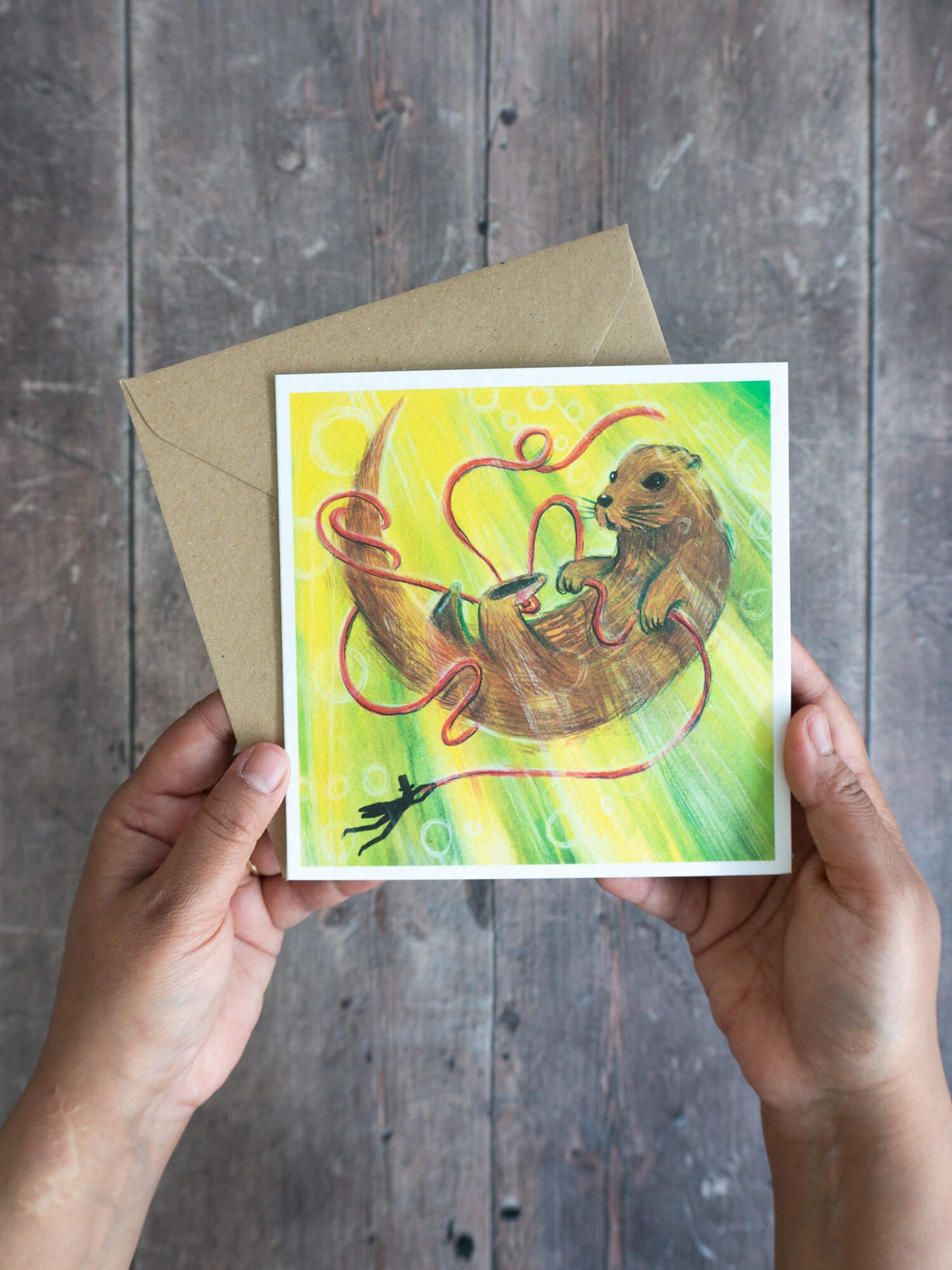 Playful Otter – (end of line) greeting card